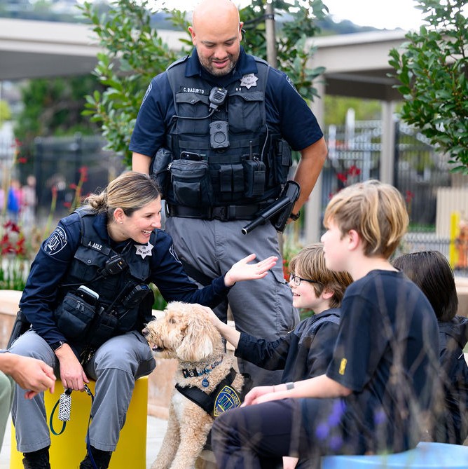 Police officer with children